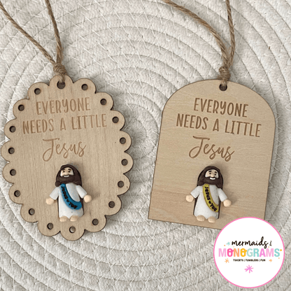 Everyone Needs a Little Jesus wooden ornament with mini Jesus charm and twine hanger