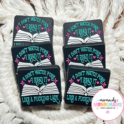 silicone beads with humorous text design on a textured white surface, featuring the brand 'Mermaid Monograms'.